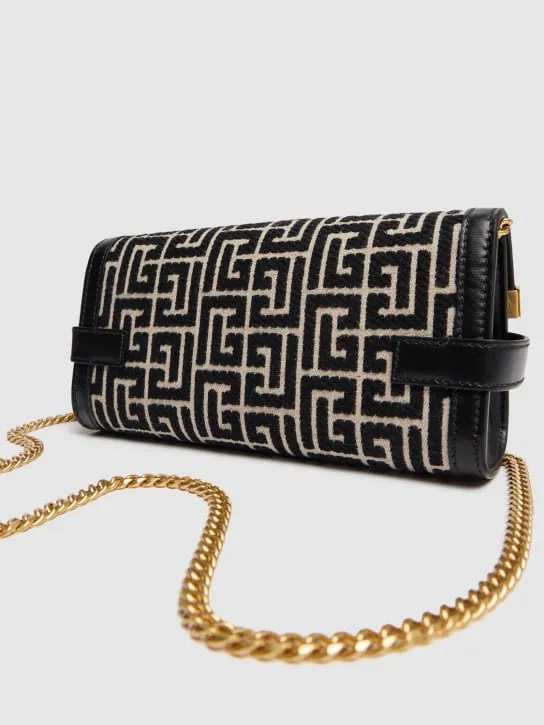 Balmain   BBuzz 23 Monogram jacquard clutch 