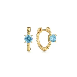 Swiss Blue Topaz Bujukan Huggies in 14K Yellow Gold